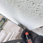 Arrosage à l'eau claire d'un point singulier de la terrasse pendant la recherche de fuite à Toulouse