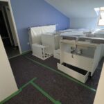 Cuisine équipée déposée et sols protégés dans le logement pendant les travaux à Saint-Orens-de-Gameville