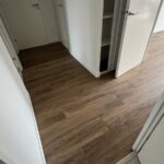 Dégagement de l'appartement avec le carrelage neuf après travaux à Saint-Orens-de-Gameville
