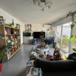 Séjour de l'appartement avec le carrelage d'origine avant travaux à Saint-Orens-de-Gameville