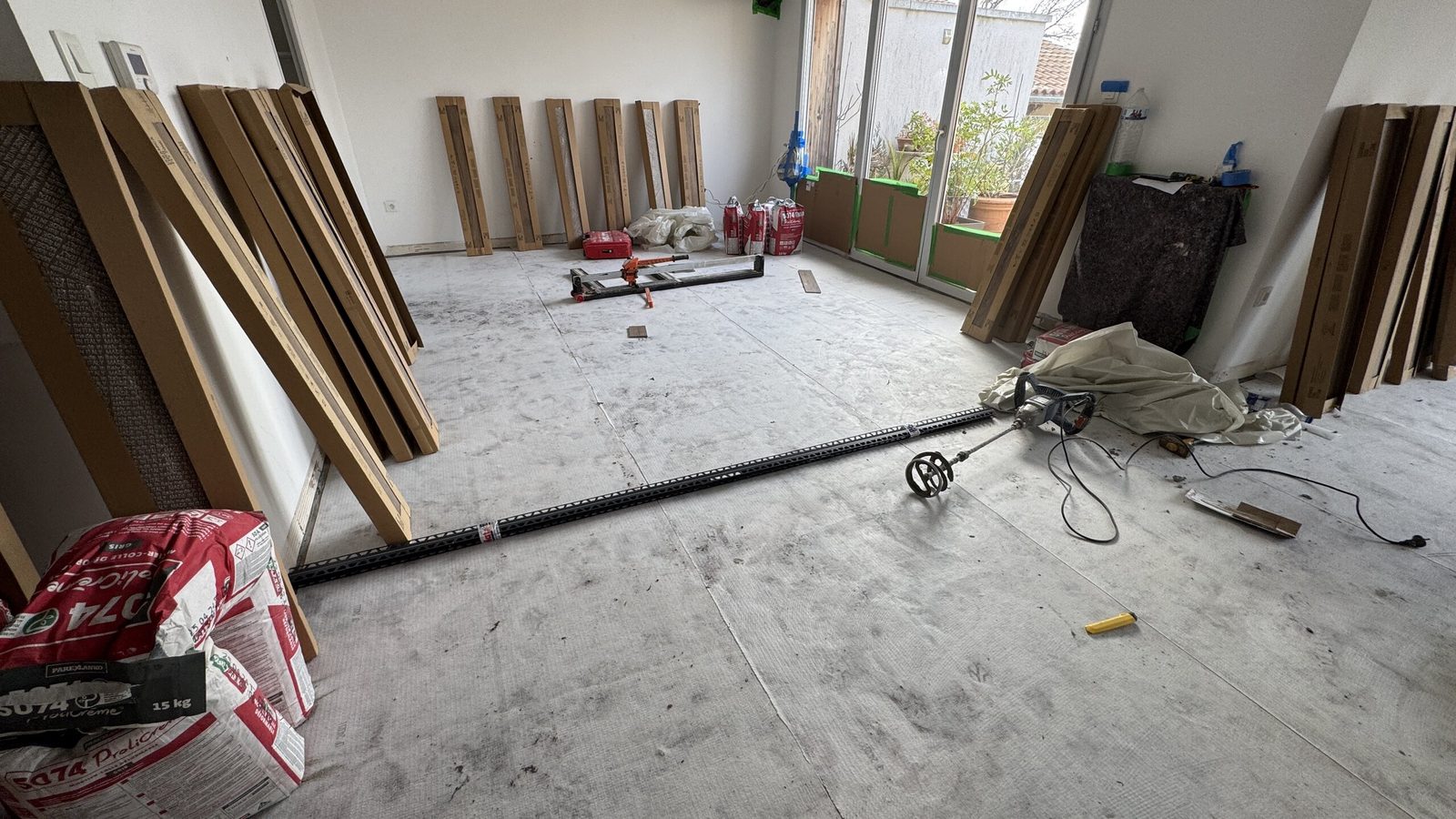 Support préparé et natte de désolidarisation posée après démolition du carrelage à Saint-Orens-de-Gameville